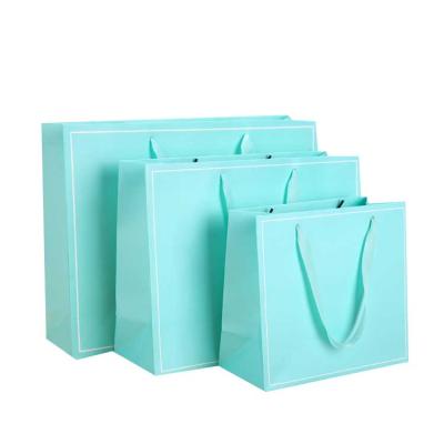 China High Quality Recycled Materials Clean Logo Printed White Cardboard Paper Gift Bags Open Paper Bag Paper Shopping Bags for sale