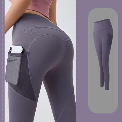 China OEM Breathable Pockets New Promotional Women Pants Yoga Gaiters for sale