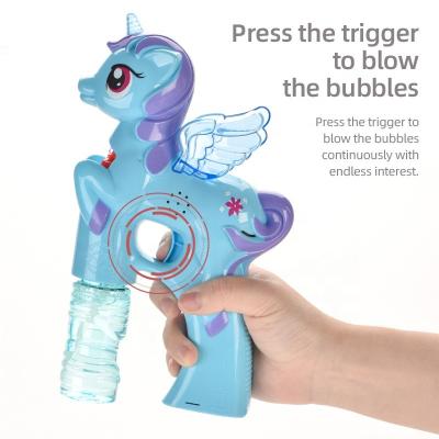 China Summer Plastic Hot Selling Unicorn Bubble Gun Soap Bubbles Wedding Animal Gun with Light and Music for sale