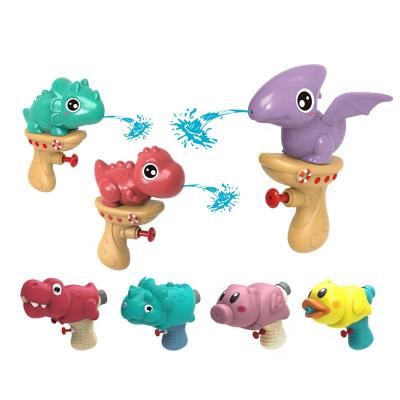 China Small dinosaur cheap manufacturers cartoon summer water gun toys for children 84x39x61 84x39x61 for sale