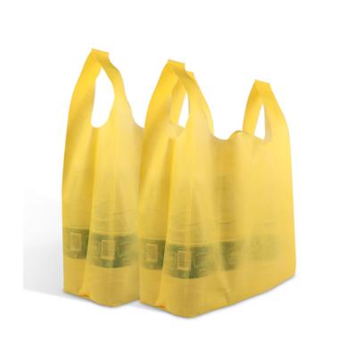 China Factory Cheap Price Eco - Friendly Any Size PP Reusable Nonwoven T - Shirt Bag , 18Gsm Supermarket W Cut Non Woven Bag , Non Woven W Cut Bags for sale