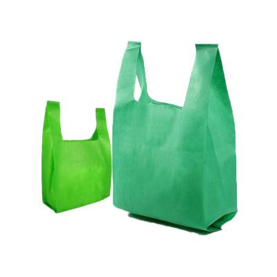 China Eco-Friendly Best Price Eco-Friendly W Nonwoven Cut Bag Latest Design New Fashion Cheap Nonwoven T-shirt Bag For Supermarket for sale