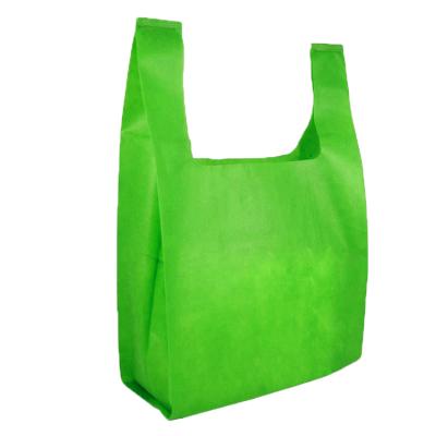 China Eco-friendly Low Price Make To Order Black Nonwoven T Shirt Bag Customized Best Selling W Cut Nonwoven Shopping Bags for sale