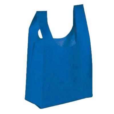 China Eco-friendly In Stock Made Of China Non Woven T Shirt Bag Eco-friendly Recyclable Pure Material W Cut Nonwoven Bag for sale