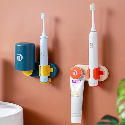 China Wall Mounted Storage Modern Toothbrush Holder Gravity Induction Holder Electric Toothbrush Free Punch Holder for sale