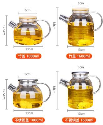 China Restaurant Home Office Hotel Borosilicate Glass Heat Resistant Teapot with Tea Infuser Warmer and Glass or Bamboo Lid for sale