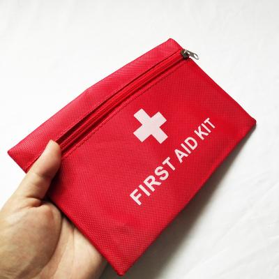 China 1680D Oxford Mini Medical High Quality Waterproof Emergency Small Home Care First Aid Kit for sale