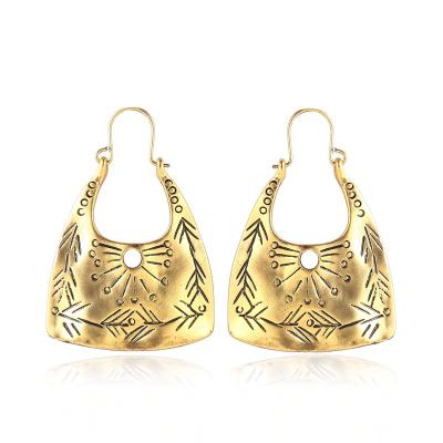 China Fashion Environmental Friendly Wholesale Earrings Bags Shaped Earrings Vintage Boho Matte Carving Earrings For Women for sale