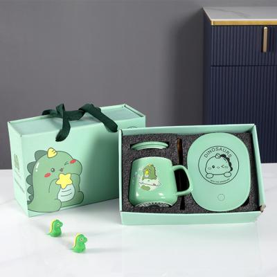 China Sustainable Creative Green Dinosaur Mug Constant Temperature Smart Coaster Heated Ceramic Mug Wholesale for sale