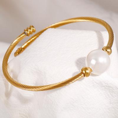 China FASHIONABLE Simple Pearl Bracelet Wire Rope Woman Bangle Custom Stainless Steel Cuff Bracelet for sale