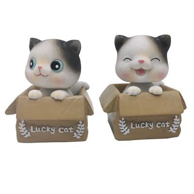 China Cute Cartoon Lucky Cat Shaking Head Car Ornaments Cartoon Resin For Car Office Home Creative Ornament Interior Decorations for sale