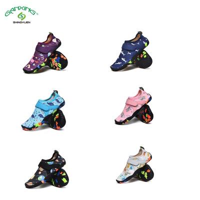 China Cushioning GANXING New Arrival Knit Red Black Plastic Kid Aqua Shoes Mesh Strap Boating Boots Trending for sale