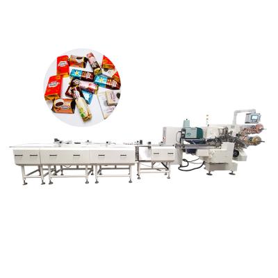 China Food Foil Packing Machine Empaquetadora De Alimentos Automatic Candy Packing Machine for sale