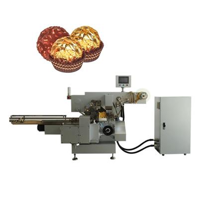 China OEM Jinmao Chocolate Packaging Machine 300pcs/min Maquina Embaladora De Food Tresor Full Automatic Dore Packaging Machine for sale