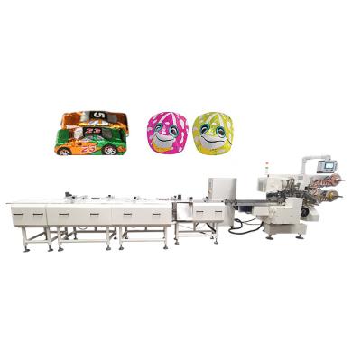 China Automatic Chocolate L Wholesale Irregular Shape Packaging Machine Machine Maquina Embrulhar Full Automatic Chocolate Bar Brush Pack Bombons for sale