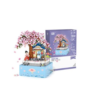 China The Building Block Toy Plug-in Educational Toys Folding Deformation Cherry Blossom Music Box Building Blocks Toys for sale