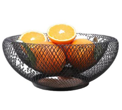 China Creative Morden Home Decoration Bird's Nest Shape Metal Fruit Basket Snack Storage Rack Kitchen Shelf for sale