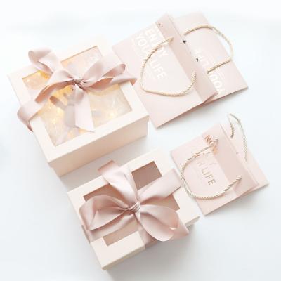 China Recyclable Valentine's Day Gift Box With Lid Transparent Scarf Dress Flip Top Ribbon Closure Cosmetic Box for sale