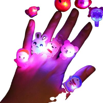 China Fashion Gift Kids Cartoon Small Silicone Finger Lamp Stall Toys Luminous Ring For Party for sale