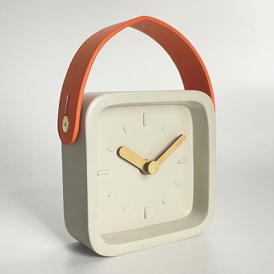 China New Arrival 4 Inch Fashion Square Resin Clock Handle Design Desk Leather Clock For Gift for sale