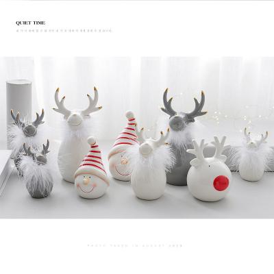 China Santa Claus European Minimalist Nordic White Ceramic Deer Head and Elk Ceramic Christmas Crafts Home Decorations for sale