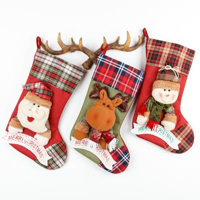 China Non-woven Large Three-Dimensional Christmas Stocking Santa Claus Christmas Socks Gift Bag Christmas Decoration for sale