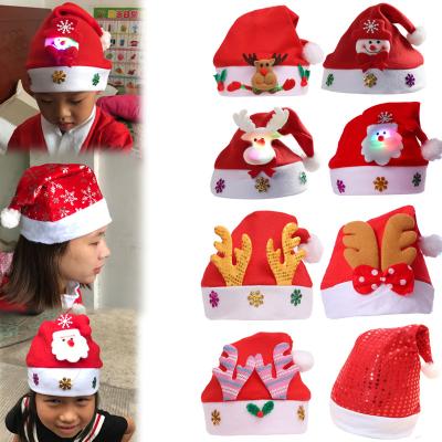 China Christmas Dceoration Cartoon Christmas Hat Santa Claus /Elk/Snowman Christmas Hat With LED Light For Kids Adult Hat for sale