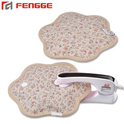 China Rechargeable FLANNEL Petal Shape Hand Warmer Heat Pack Electric Hot Water Bottle for sale