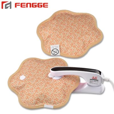 China Printed Fabric Petal Shape Rechargeable Hand Warmer Bag Electric Hot Water Heating Pack for sale