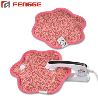 China Printed Fabric Petal Shape Electric Hand Warmer Rechargeable Hot Water Heat Pack for sale