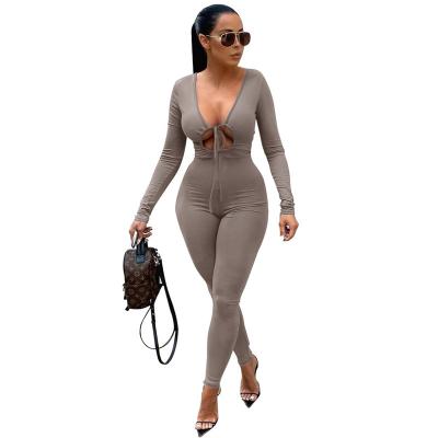 China QUICK DRY Ribbed Crisscross Women's Solid Casual One Piece Rompers Backless Sporty Workout Overalls Fitness Jumpsuits Long Sleeve for sale