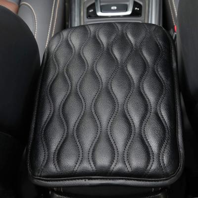 China Geometric Universal XMB PU Car Armrest Adjustment Seat Box Center Protector Auto Console Pad Leather Armrest Cover. for sale