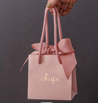 China Custom Recycled Jewelry Garment Cloth Production Phone Materials Promotional Jewelery Kraft Paper Bag With Ribbon for sale