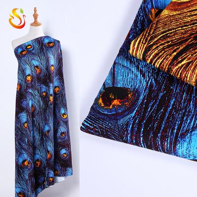 China Anti-Static Cotton Fabric Peacock Feathers Print DIY Cotton Sateen For Dress Fabric Custom for sale