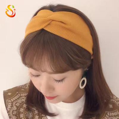 China Autumn And Winter Vintage Wool Hair Band Cross Knotted Headband Korean Wide Elastic Korean Casual Hair Band Knitted Head Scarf for sale