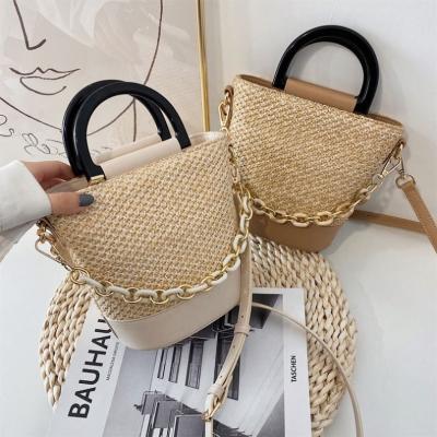 China New 2021 Summer Korean Version Lightweight Simple Solid Color Women's Knitting Cross Straw Handbags Woven Small Square - Body Shoulder Bag for sale