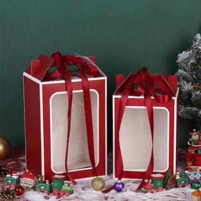 China Recycled Materials Christmas Red Gift Giving Present Christmas Cardboard Packaging Paper Portable Box With Clear Window for sale