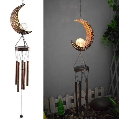 China Classic Time Amazon Light Control Self-Flashing Metal Slow Solar Filling Hollow Process Round Cracked Ball Shape Wind Chime Lighting for sale