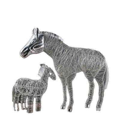 China Amazon handmade wholesale slow creative gifts home decorative modern ornaments TS-NYH802800 modern times iron horse decoration resin crafts for sale