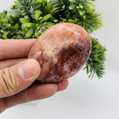 China Wholesale Natural Europe Fire Quartz Palm Stone Crystal Polished Stone Free Form For Healing for sale