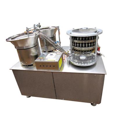 China Automatic Beverage Shake Off Cap Set Machine for sale