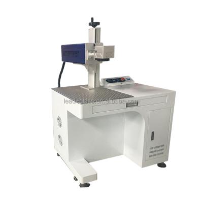 China Factory direct sales Raycus35w desktop portable co2 laser marking machine for ceramic handicraft marking for sale