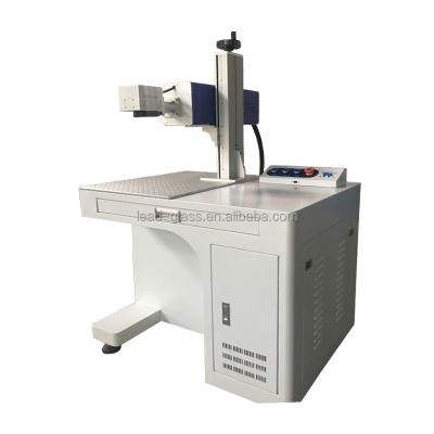 China Desktop CO2 20w laser marking machine for metal plastic jewelry wood glass material marking for sale