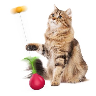 China New Design Cat Teaser Feather Tumbler Leaky Ball Cat Play Pet Interactive Movement Stocked Toys for sale