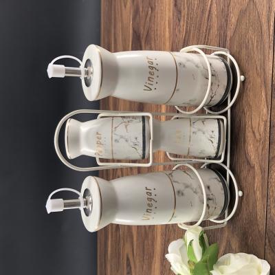 China Modern Oil Pump Vinegar Oil Dispenser Soap Dispenser Bottle Modern Cosmetic Ceramic Oil Pump Stored Ceramic Oil Bottle for sale