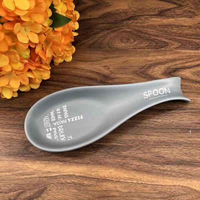 China Modern Kitchen Stocked Ceramic Spoon Rest For Stove Cookware Rest Porcelain Pocket Spoon Top Holder for sale