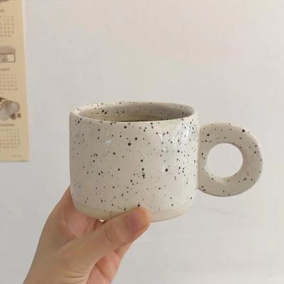 China China Central Statistical Institute Style Handle Creative Irregular Mug Ceramic Coffee Mug for sale