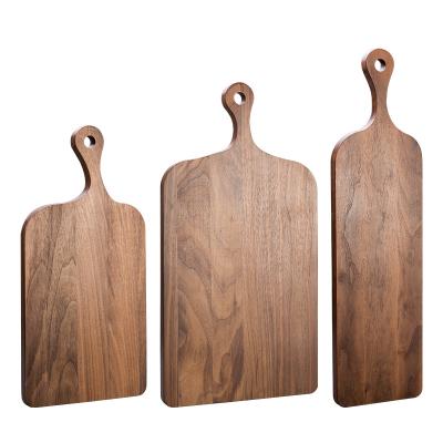 China Custom/Wholesale Disposable Black Walnut Wooden Cutting Plates Set With Handle Cheese Charcuterie Food Serving Kitchen Wooden Chopping Board for sale