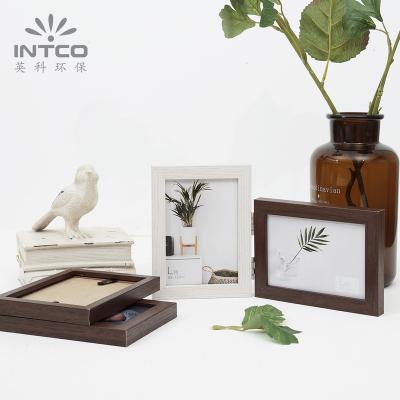 China INTCO Eco-friendly Durable Hot Selling Book Style Wooden Photo Folding Glass Picture Frame for sale