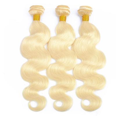 China Russian Wholesale Curly Free Sample Russian Wefted Curly Hair Extensions Platinum 613 Raw Hair Body Wave Bundles With Closure for sale